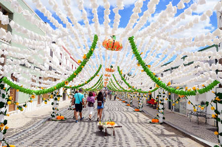 Flower Festival Festas do Povo, Campo Maior 2015. Many streets of the historic center are coated With Thousands of paper flowers, handmade by the people of Campo Maior. Photo taken on: August 24th, 2015.のeditorial素材