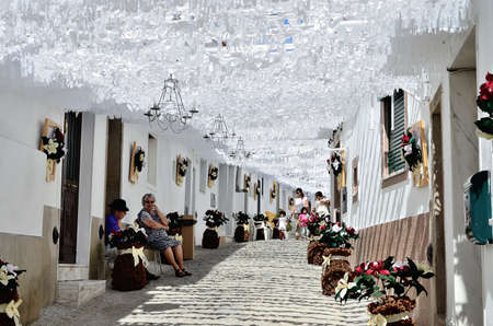 Flower Festival Festas do Povo, Campo Maior 2015. Many streets of the historic center are coated With Thousands of paper flowers, handmade by the people of Campo Maior. Photo taken on: August 24th, 2015.のeditorial素材