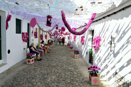 Flower Festival Festas do Povo, Campo Maior 2015. Many streets of the historic center are coated With Thousands of paper flowers, handmade by the people of Campo Maior. Photo taken on: August 24th, 2015.のeditorial素材