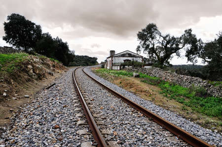 landscape with halt and abandoned railroad tracksの写真素材