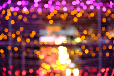 Lights blurred bokeh background from LED bulbs in the New Yearの写真素材