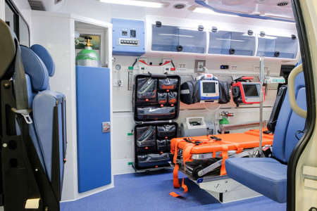 Inside an ambulance with medical equipment for helping patients before delivery to the hospital.