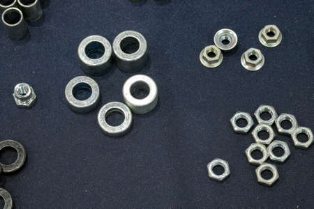 Industrial medium and small size knots, put on blue-black fabric on top-view. for on an industry...
