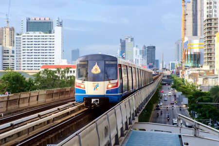 Bangkok-Thailand AUG 19 2019: BTS Sky Train on cityscape background in daytime , Sky Train is a mass transit system in Bangkok to assist facilitate and fast journeyのeditorial素材