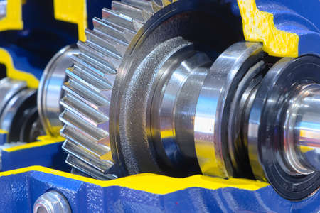 Close-up metal cog gear from inside of industrial motor pump