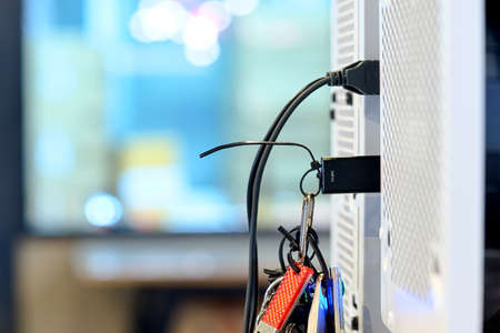 Selective focus black USB 3.0 flash drive connect with USB port on computer motherboard of PC...