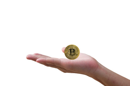 Close-up Golden Bitcoin virtual symbol on hand man, a money digital on cyber world, to use online...