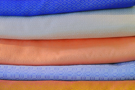 Close-up multicolored of silk cotton from handmade on Thai style background