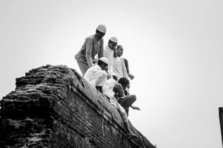 they climbed on a wall and getting fun.のeditorial素材