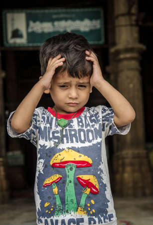 Little boy street portraitのeditorial素材