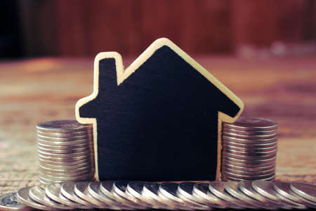 stack coins and house model for business and financail,saving money.の写真素材