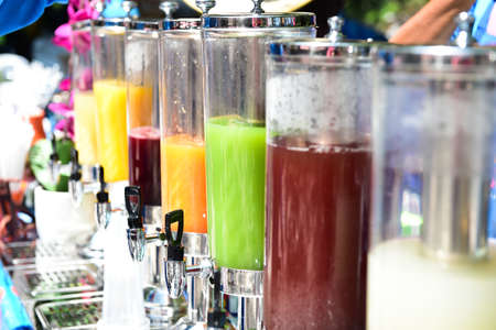 Many types of fruit juices on the beachの写真素材