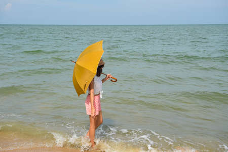 the girl on the beachの写真素材