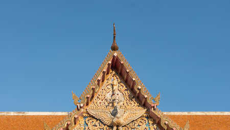 Thailand temple art roof with blue skyの写真素材