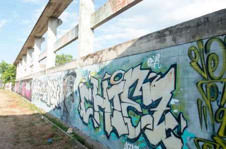 HUA HIN ,THAILAND - May30,2015 :Graffiti abandoned old factory structure.Main Street entrance to the townのeditorial素材