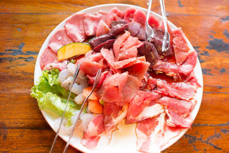 Mix raw meat ready to grill and toastの写真素材