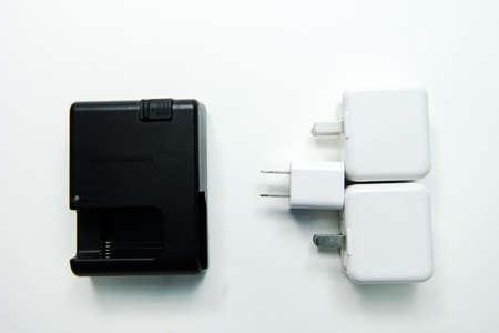 Battery charger for camera and phone