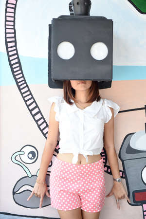 The girl take photo with art box at coffee drip ,huahin thailandの写真素材