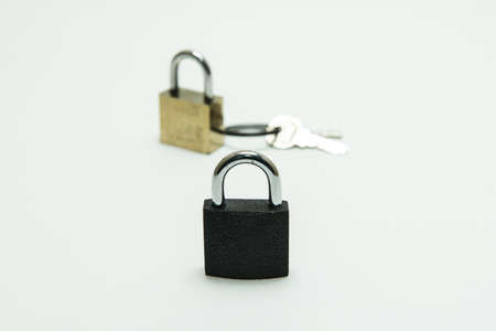 black padlockcombination lock, bicycle lock locked isolated whiteの写真素材