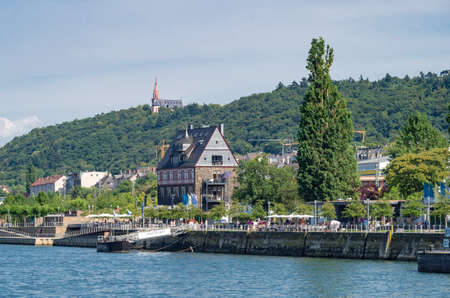 View on the landing place Bingen (Germany) with historical frame house from the Rhine River. Bingen, Germany - August 1 2015のeditorial素材