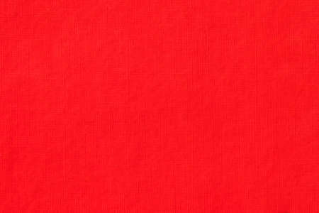 Red canvas background with a tinge of orangeの写真素材