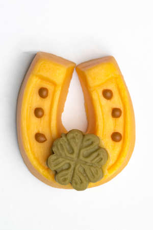 Isolated sweet lucky charm horseshoe made of marzipanの写真素材