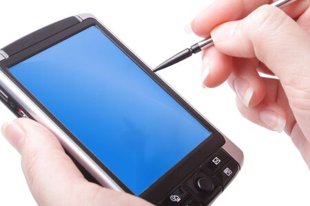 PDA and stylus in hand (close up, isolated)の写真素材