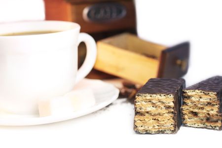 ground coffee and grinder on white backgroundの写真素材