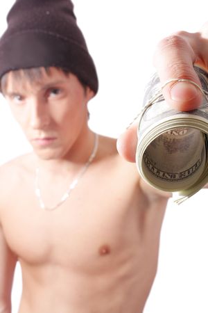 close up money roll in hand on white background (isolated)の写真素材