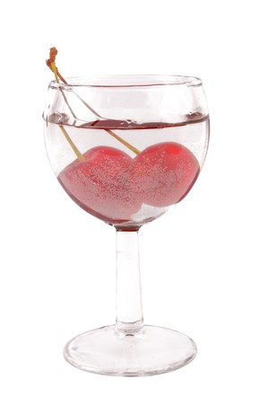 Cherry in water on white background  の写真素材