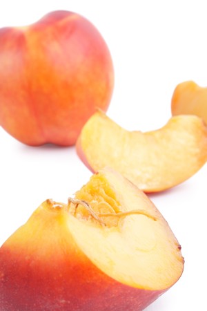 Ripe Nectarine on white background (isolated, clipping path)の写真素材
