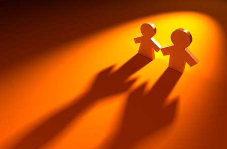 two figures on the red backgroundの写真素材