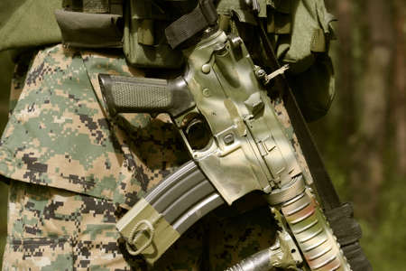 Detail of an armed U.S. Marine corps soldier.の写真素材