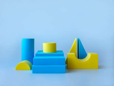 Composition with podiums for the presentation of products. Layout of the scene with yellow figures...