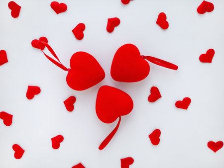 Valentines day concept with red hearts. Abstract background. Flat lay, copy spaceの写真素材