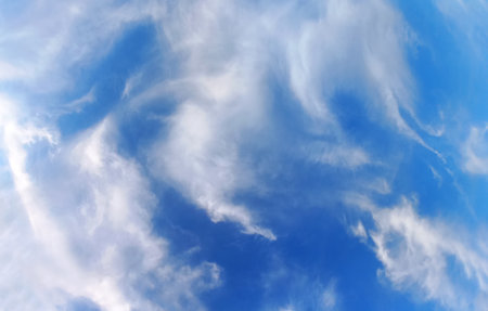 Divine blue sky and fluffy white clouds