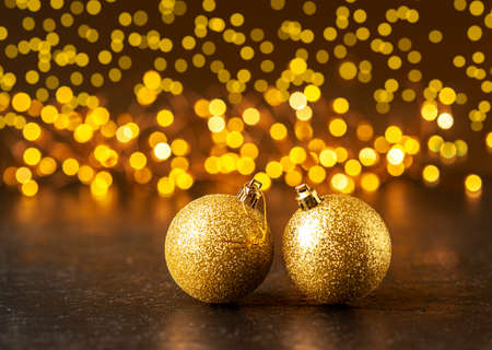 Christmas decorations. Christmas balls on a dark background with bokeh. Selected sharpness.の写真素材