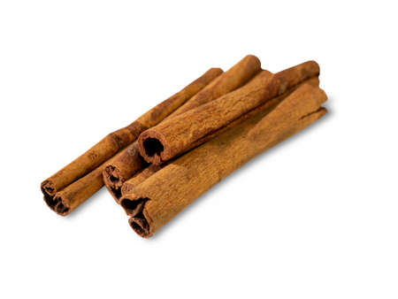 Fragrant cinnamon sticks isolated on a white background close-up. Oriental spices.