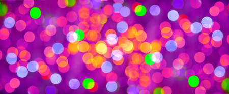 Lights of the festive background. Abstract, bright multicolored background, blurred bokeh, bannerの写真素材