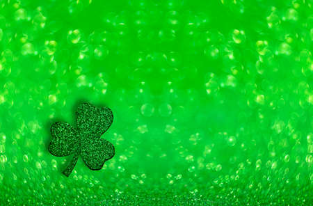 St. Patrick's Day. Light green lights. Bokeh in the shape of a clover. Blurry, fuzzy, abstract...
