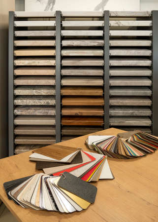 Furniture production. Catalog of samples of materials for kitchen countertops, facades made of artificial stone, plastic, laminate and chipboardの写真素材