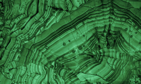 Malachite is a green mineral gemstone texture. Semiprecious ornamental stone malachite. green backgroundの写真素材