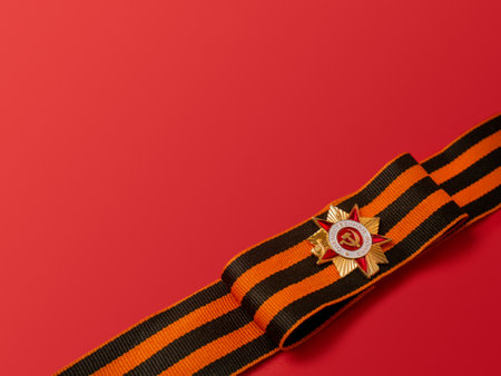 Victory Day 1945. The holiday is May 9th. St. George ribbon and medal on a red background with a...