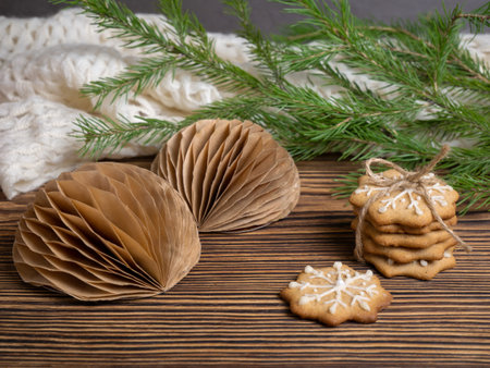 Ginger cookies for Santa Claus. Christmas decorations made of craft paper. Eco-friendly decor, paper recycling, no wasteの写真素材