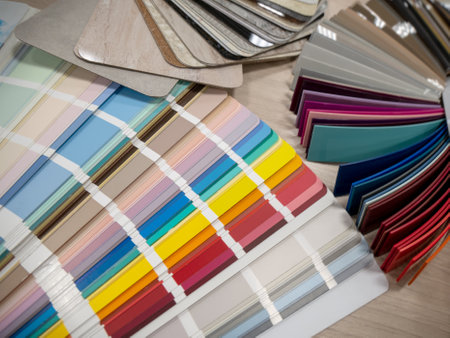 Palette of colors and sample of materials for the production of kitchen furniture. Bright plastic...