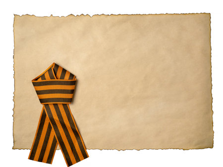 A piece of old paper for your text and a St. George ribbon. Victory Day in 1945. The holiday is May 9thの写真素材