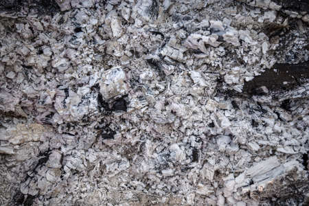 Ash natural background texture, Gray ash from the oven background texture, cinder, gray ash from woodの写真素材