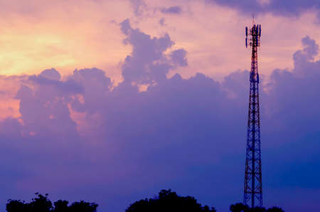 Look beautiful sky background and telephone tower.Sky, Bright Blue, Orange And Yellow Colors Sunset. Instant Photo, Toned Imageの写真素材