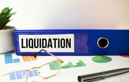 blue file folder with words take liquidation . Business concept