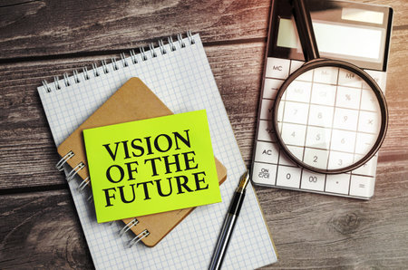 Vision Of The Future words and green sticker on wooden backgroundの写真素材